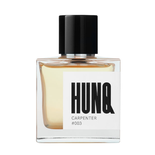 HUNQ - #003 Carpenter Parfumflakon mit klarem Glas und schwarzem Deckel vor weißem Hintergrund