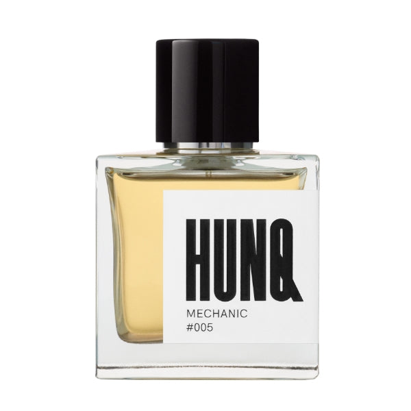 HUNQ - #005 Mechanic Parfumflakon mit schwarzem Verschluss und quadratischem Glas vor schlichtem weißem Hintergrund