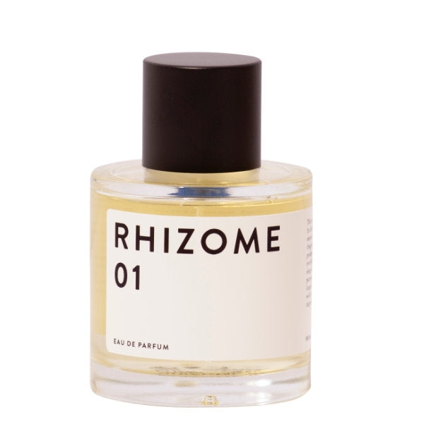 Rhizome - 01 zeigt klaren Glasflakon mit schlichtem Etikett und dunklem Verschluss vor weißem Hintergrund