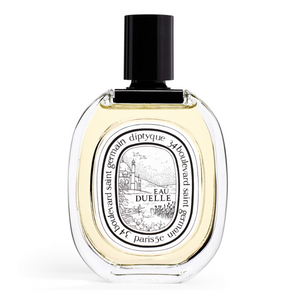 Diptyque - Eau Duelle klarer Flakon mit schwarzem Verschluss und hellgelbem Inhalt vor weißem Hintergrund
