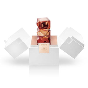 FO'AH - Collection Mémoires d'une Palmeraie - 14 Parfumflakon in facettenreichem bernsteinfarbenem Design offen präsentiert in weißer Verpackung