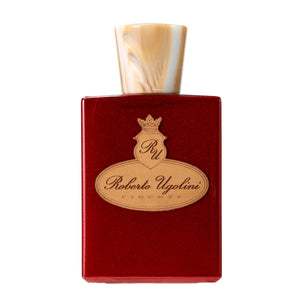 Roberto Ugolini - 17 Rosso Parfumflakon in tiefrotem Glas mit beigefarbenem Marmordeckel vor weißem Hintergrund