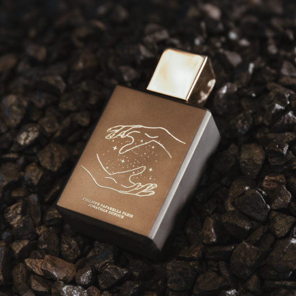 Spiritum - 22 - Universal Mind Flakon in matter Bronze mit goldfarbener Illustration auf dunklem, steinigem Untergrund