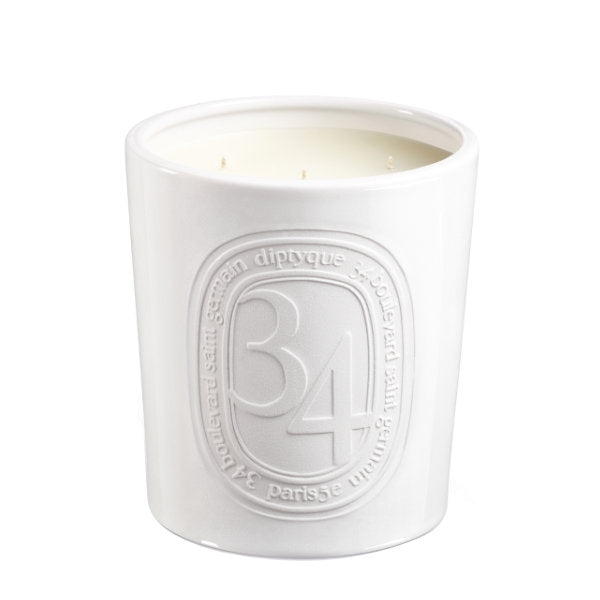 Diptyque - 34 Boulevard Saint Germain - Duftkerze im weißen Terrakottagefäß mit fünf Dochten minimalistisch präsentiert