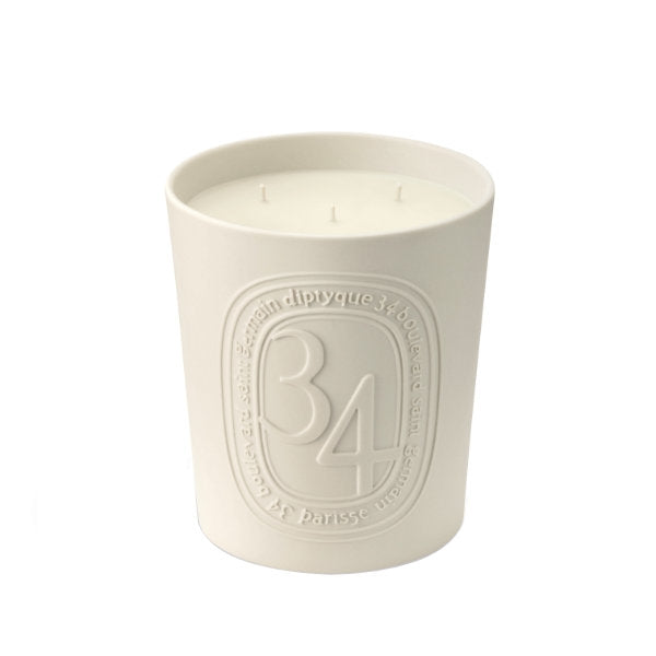 Diptyque - 34 Boulevard Saint Germain - Duftkerze - 600 g im weißen Biskuitporzellan mit drei Dochten minimalistisch präsentiert