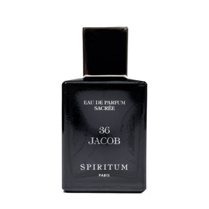 Spiritum - 36 Jacob dunkler Parfumflakon mit minimalistischer weißer Schrift vor hellem Hintergrund