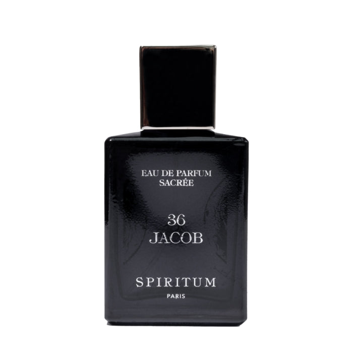 Spiritum - 36 Jacob dunkler Parfumflakon mit minimalistischer weißer Schrift vor hellem Hintergrund