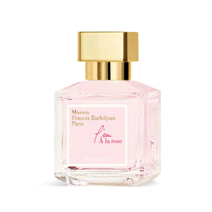 Maison Francis Kurkdjian Paris - l'eau À la rose Parfumflakon mit zart rosa Flüssigkeit und goldfarbenem Verschluss vor weißem Hintergrund