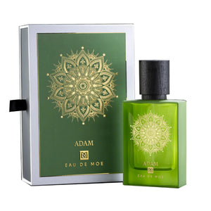 Eau De Moe - Adam Parfümflakon in grünem Glas mit goldenem Mandala und schwarzem Holzkorken vor weiß-grünem Hintergrund