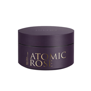 Initio - Atomic Rose - Body Cream dunkelviolette Dose mit goldener Schrift vor weißem Hintergrund