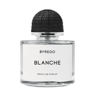 Byredo - Blanche - Absolu de Parfum Flakon mit klarem Glas und schwarzem, texturiertem Deckel vor weißem Hintergrund