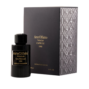 ArteOlfatto - Capsule 1990 Parfumflakon mit geriffeltem schwarzem Design und eleganter goldener Prägung neben stilvoller Verpackung