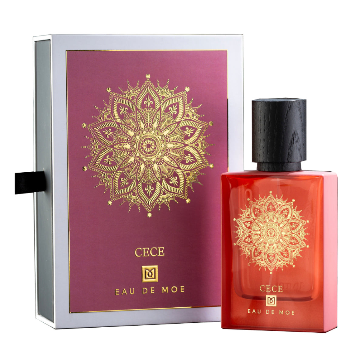 Eau De Moe - Cece Parfum in Koralle mit filigranem goldenen Mandala und schwarzem Holzverschluss neben edler Verpackung