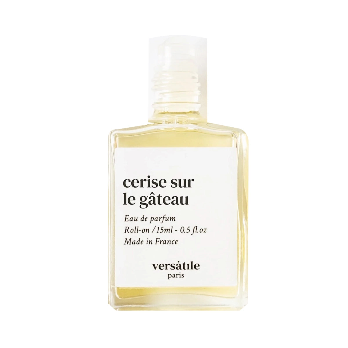 Versatile - Cerise sur le Gâteau Roll-on Parfumflakon mit klarem Design und weißem Etikett vor weißem Hintergrund
