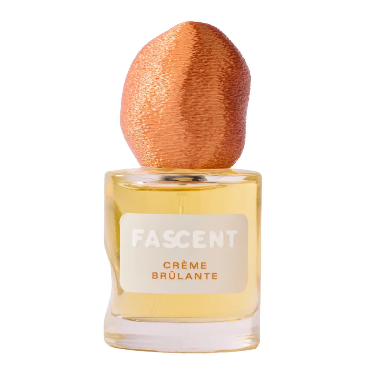 Fascent - Crème Brûlante Parfumflakon mit warmem bernsteinfarbenem Duft und außergewöhnlichem kupferfarbenem Deckel vor weißem Hintergrund