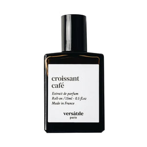 Versatile - Croissant Café Roll-on Flakon in schlichtem Schwarz mit weißem Etikett und moderner Typografie auf weißem Hintergrund