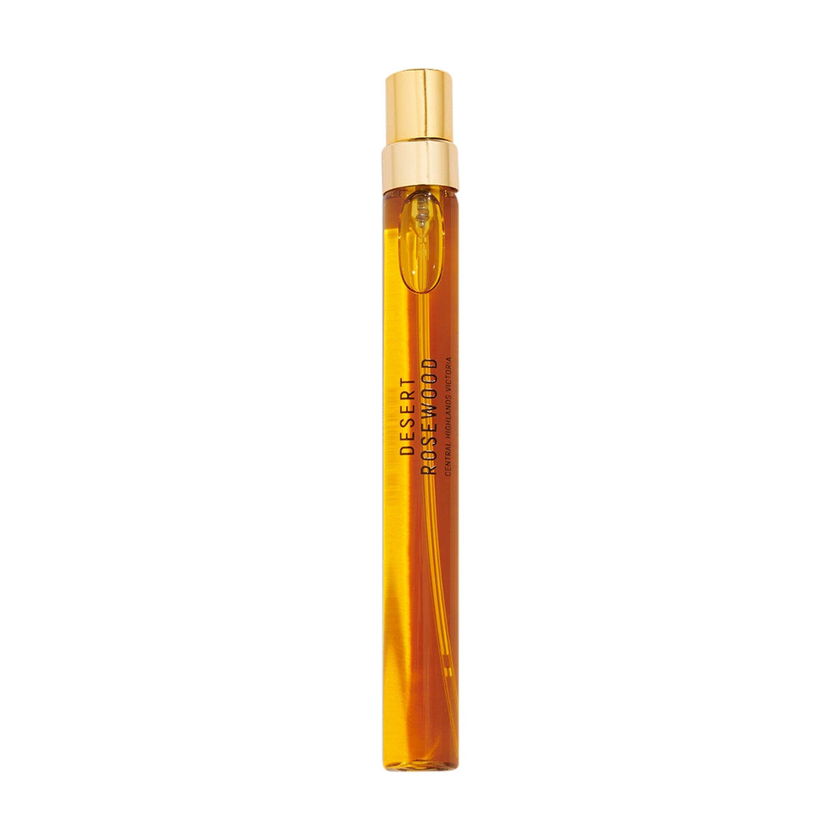 Goldfield & Banks - Native Collection - Desert Rosewood Duftroller mit bernsteinfarbener Flüssigkeit und goldenem Verschluss auf weißem Hintergrund