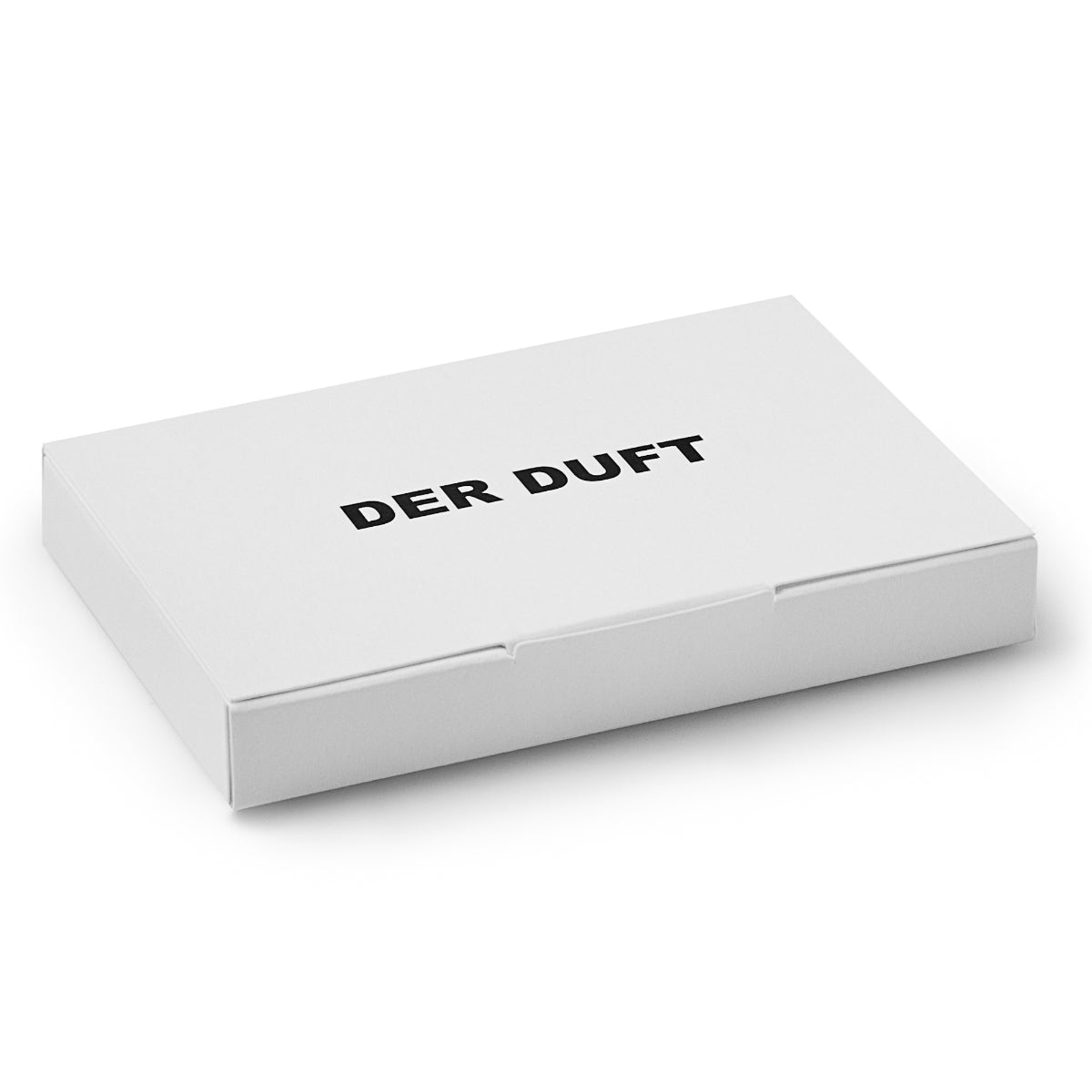 DER DUFT - Discovery Set in schlichter weißer Verpackung mit schwarzer Schrift auf mattem Karton
