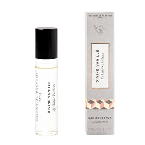 Essential Parfums - Divine Vanille kleiner klarer Flakon mit schwarzem Verschluss neben grauer Verpackung mit geometrischem Muster