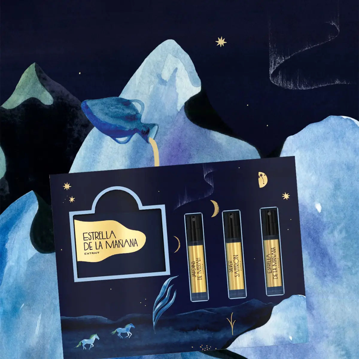 Une Nuit Nomade - Extraits de Voyage - Discovery Kit mit drei Duftproben vor nächtlicher Bergkulisse und Sternenhimmel
