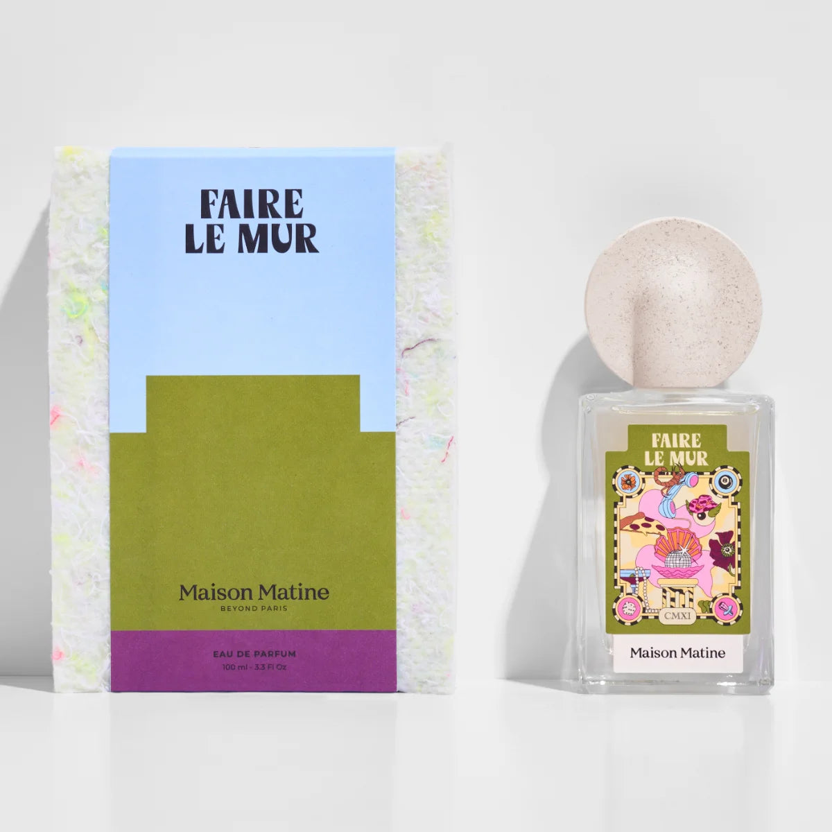 Maison Matine - Night Fever Collection - Faire le Mur zeigt Flakon mit kreativem Etikett und rundem beigem Verschluss neben farbiger Verpackung