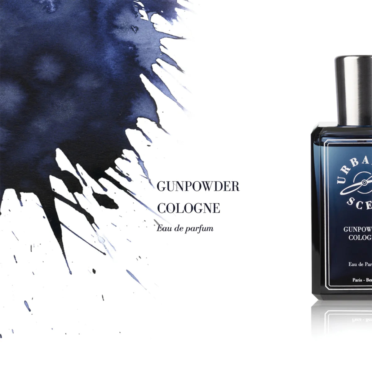 Urban Scents - Gunpowder Cologne Eau de Parfum im dunkelblauen Flakon mit silbernem Verschluss vor weißem Hintergrund
