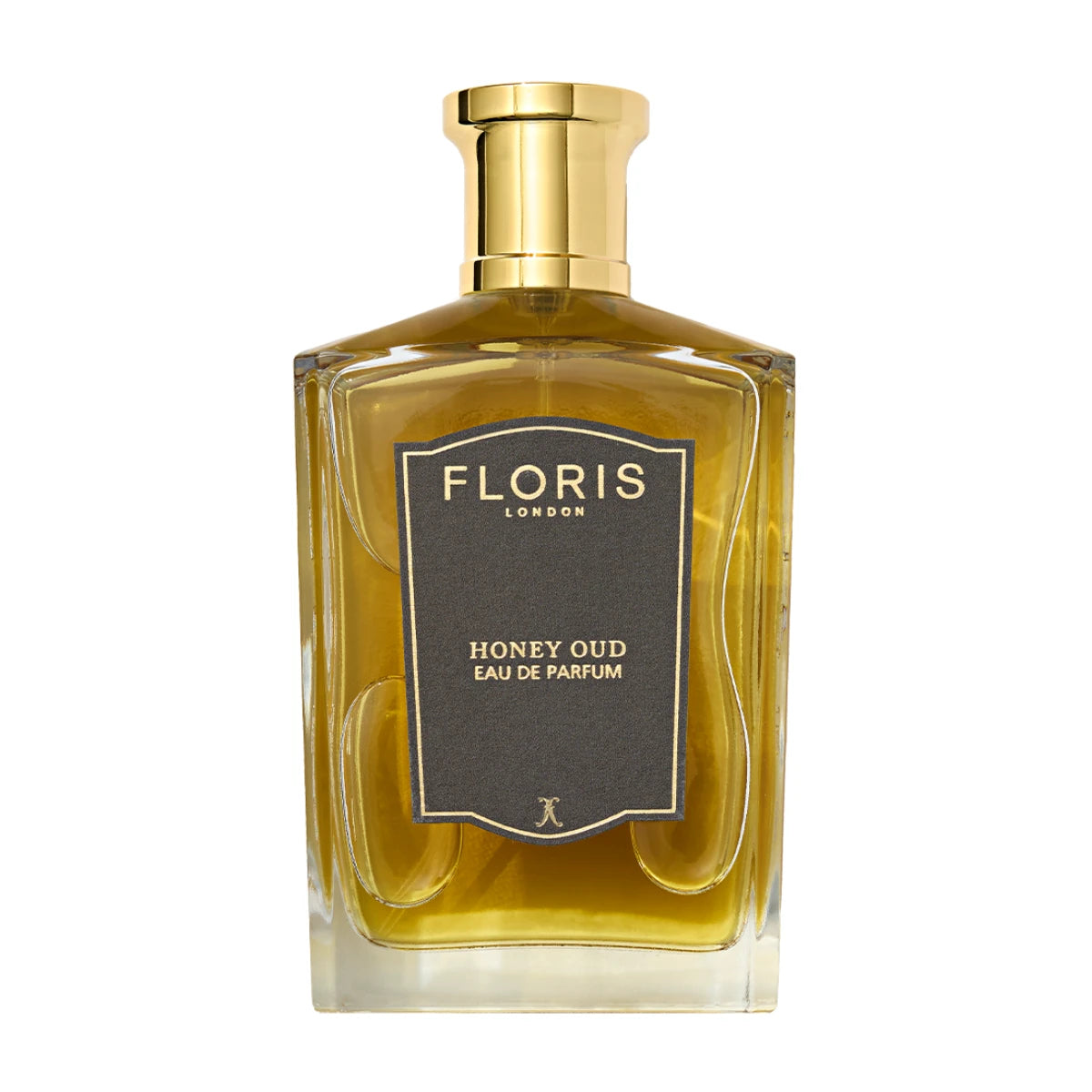Floris - Honey Oud Parfümflakon mit goldfarbenem Verschluss und bernsteinfarbener Duftflüssigkeit im klaren Glasdesign