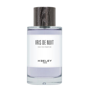 Heeley - Iris de Nuit Parfumflakon mit hellem Lavendelton und dunkelgemasertem Verschluss vor weißem Hintergrund