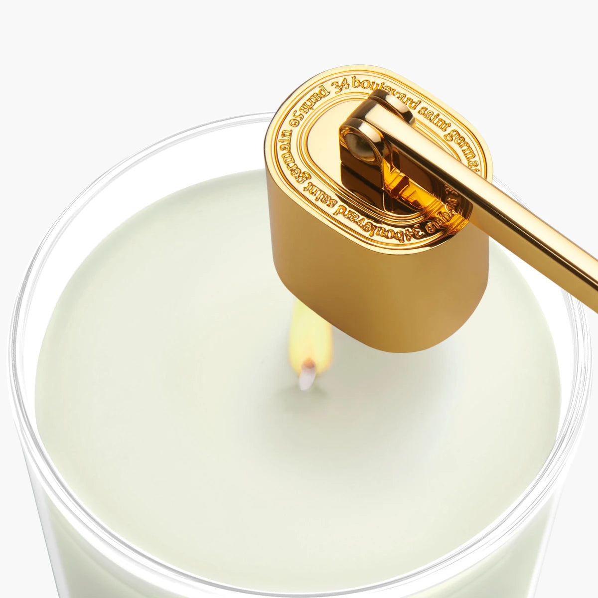 Diptyque - Kerzenlöscher in elegantem goldfarbenem Design löscht Flamme sanft und rauchfrei mit einer Handbewegung