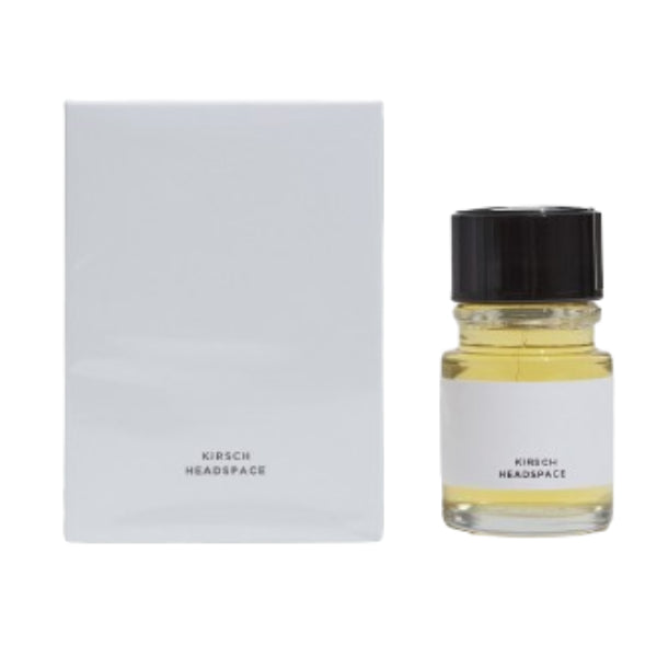 Headspace - Kirsch kleiner Glasflakon mit hellem Parfum und minimalistischer, weißer Verpackung auf weißem Hintergrund