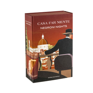 Casa Far Niente - Negroni Nights Verpackung mit florentinischer Skyline und stilisierter Figur in elegantem Hut