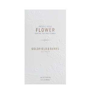 Goldfield & Banks - Pacific Rock Flower Verpackung in elegantem Weiß mit geprägt floralem Muster und goldener Schrift vor hellem Hintergrund