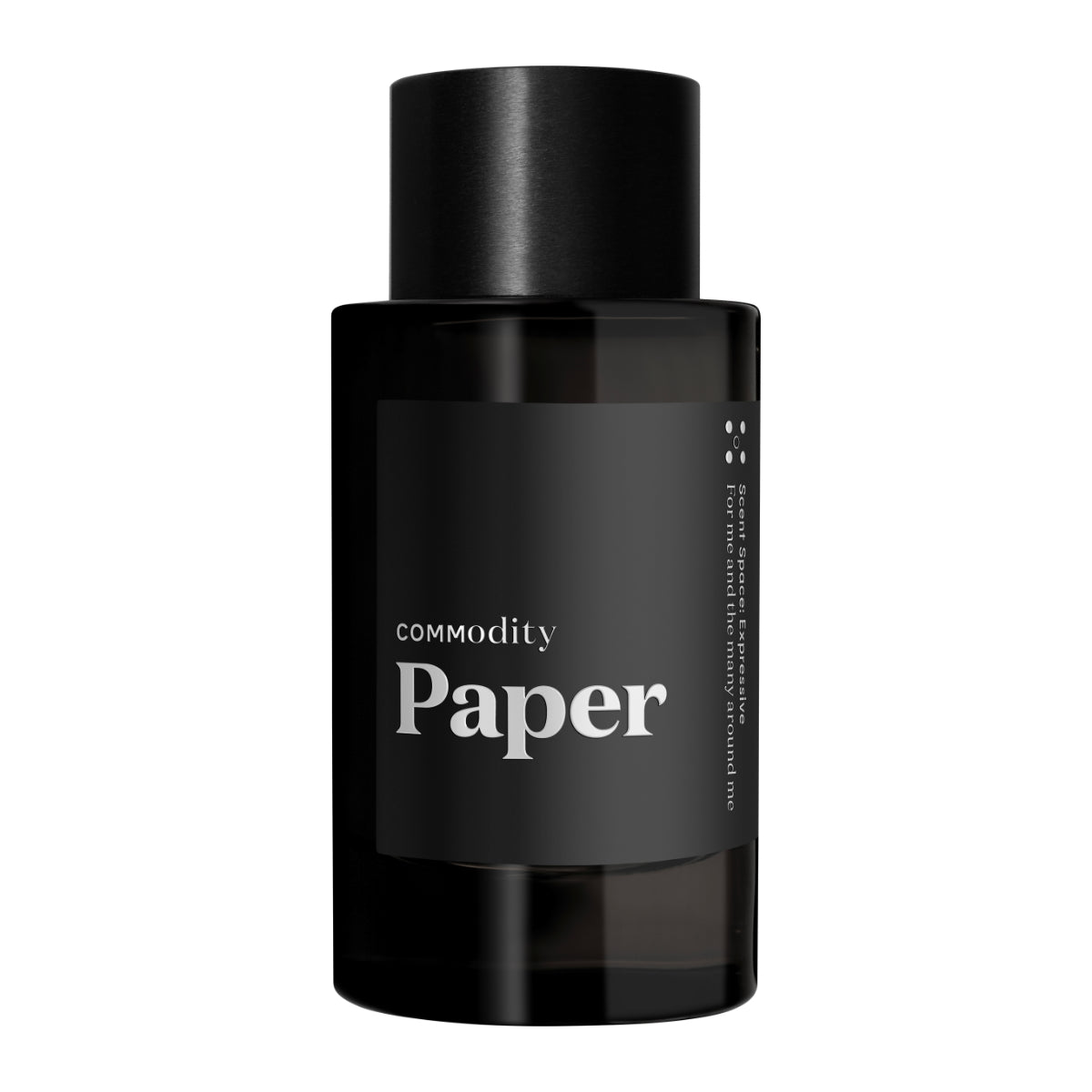 Commodity - Paper Parfumflakon in elegantem schwarzem Design auf weißem Hintergrund inszeniert