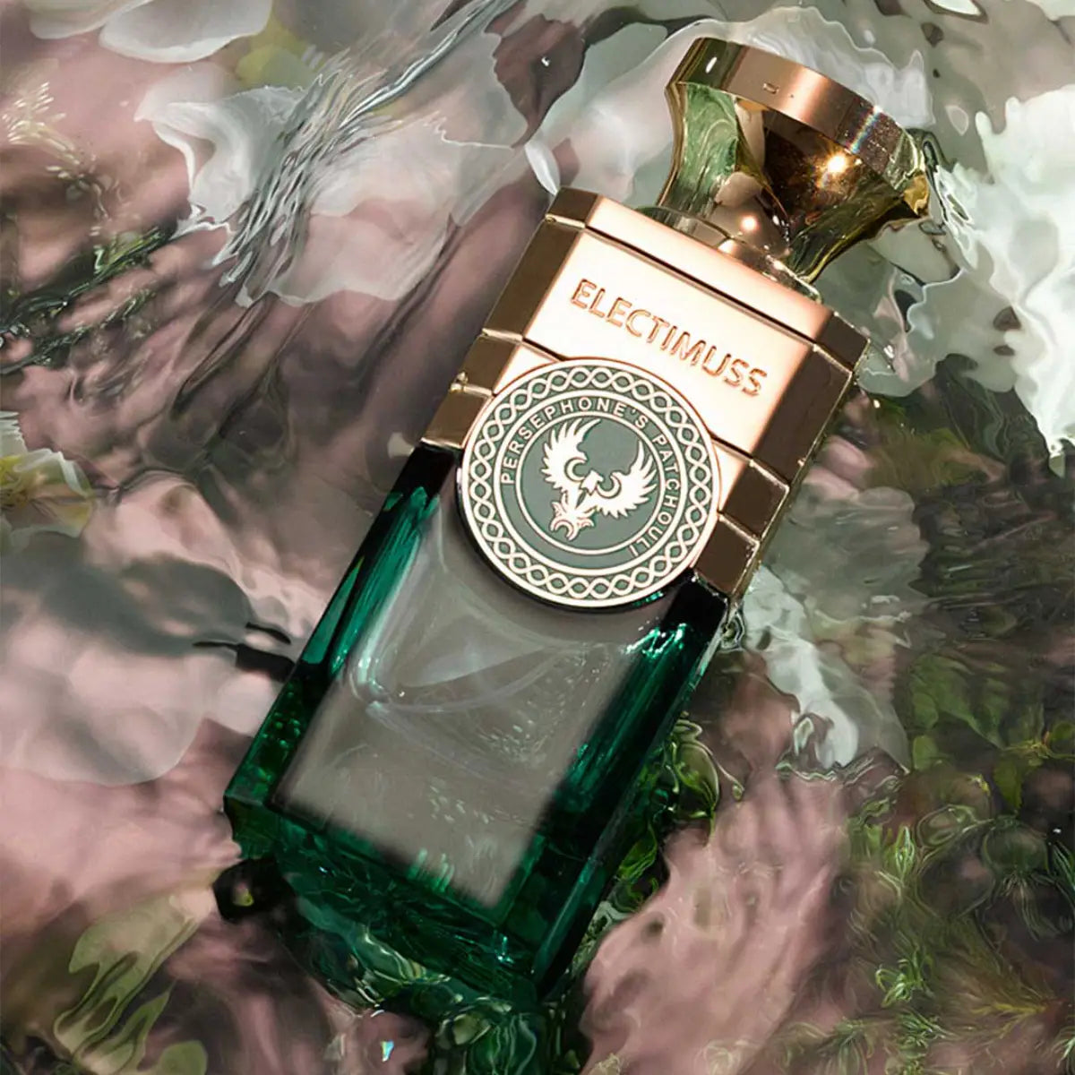 Electimuss - Persephone's Patchouli Flakon mit grünem Glas und kupferfarbenem Verschluss in edler, moderner Gestaltung