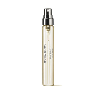 Molton Brown - Rose Dunes schlanker transparenter Reisezerstäuber mit silbernem Sprühkopf vor weißem Hintergrund