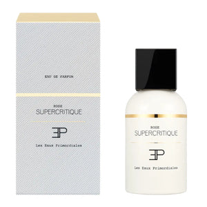 Les Eaux Primordiales - Rose Supercritique zeigt eleganten weißen Flakon mit schwarzem Deckel und passender Verpackung