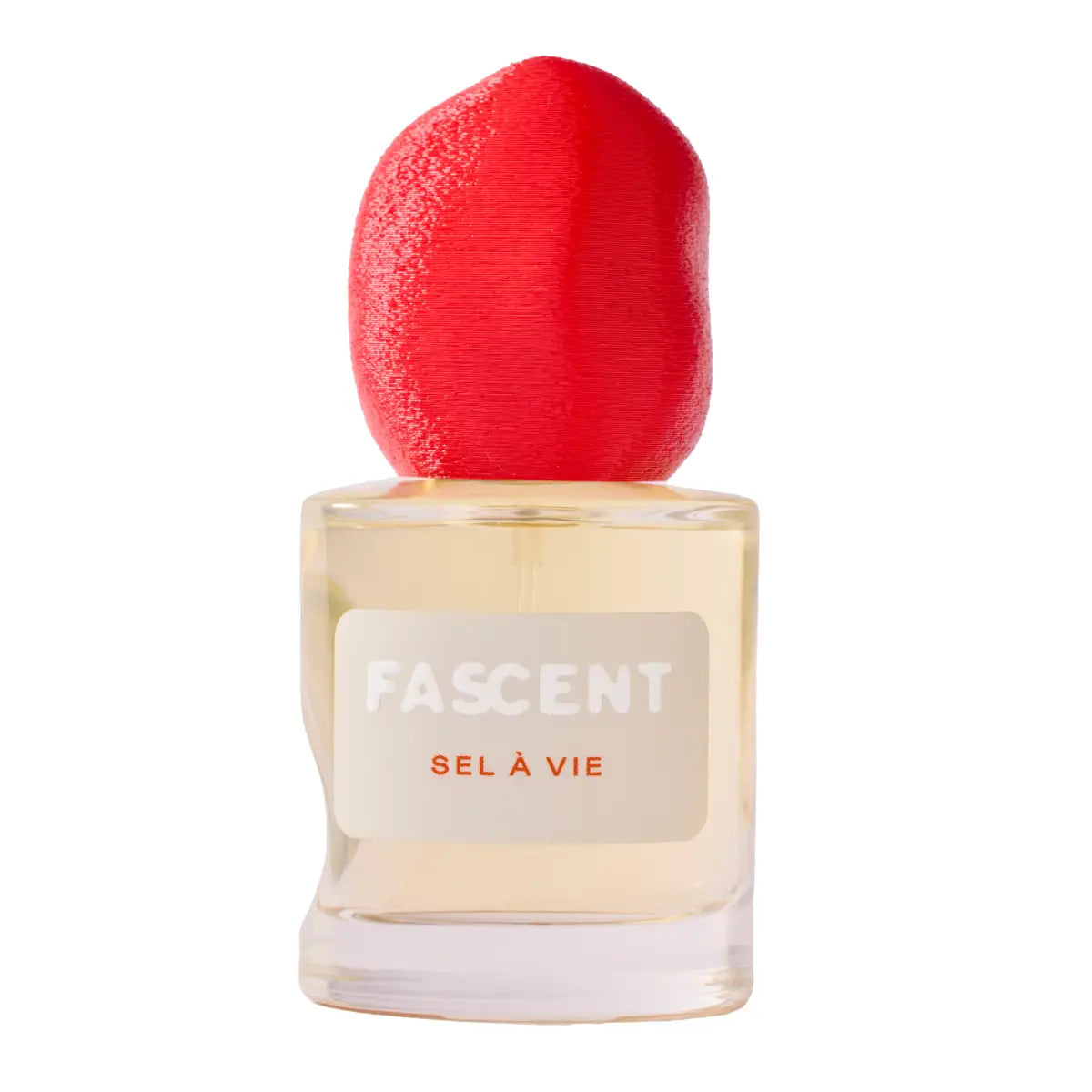 Fascent - Sel à Vie Parfumflakon mit markant geformtem, roten Deckel auf klarem Glas vor weißem Hintergrund