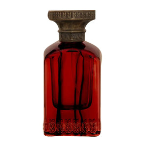 Anfas - Fosol Collection - Shaouq zeigt roten Glasflakon mit dekorativem Verschluss und elegantem, klaren Design