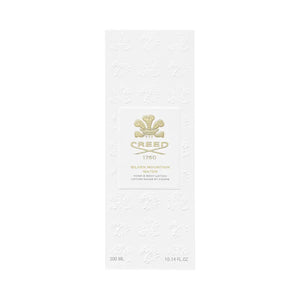 Creed - Silver Mountain Water - Hand & Body Lotion in eleganter weißer Verpackung mit goldfarbenem Logo und Prägung