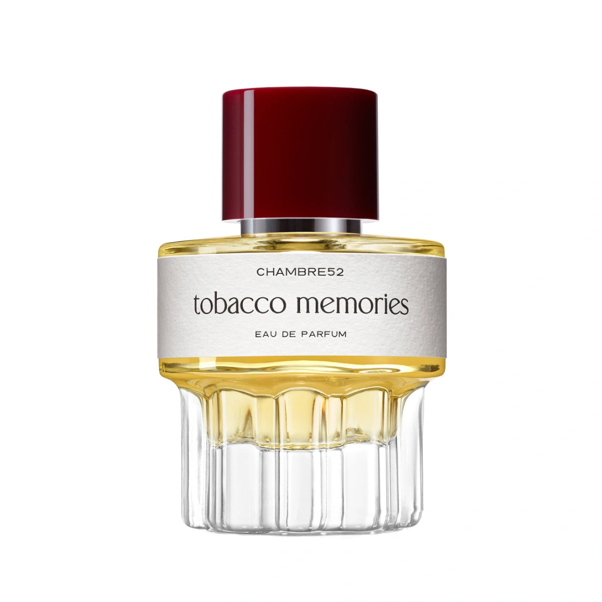 Chambre52 - Tobacco Memories zeigt eleganten Flakon mit hellem Parfum und dunklem Verschluss vor weißem Hintergrund