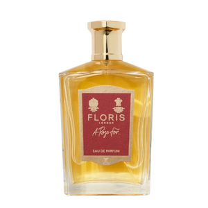 Floris - A Rose for... Parfümflakon mit goldenem Verschluss und bernsteinfarbener Flüssigkeit vor weißem Hintergrund