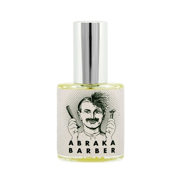 Erik Kormann - Abrakabarber Parfumflakon mit silbernem Zerstäuber und kreativem Barber-Design vor weißem Hintergrund