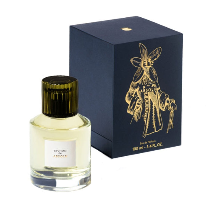 Trudon - Absolu Parfümflakon mit dunkelgrünem Verschluss neben eleganter blauer Verpackung mit goldener Illustration