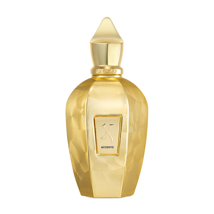 Xerjoff - Vibe - Accento Overdose goldener Parfumflakon mit facettiertem Design und markanter Kappe auf weißem Hintergrund
