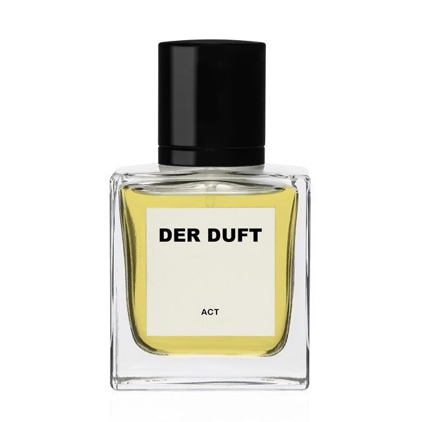 DER DUFT - Act Parfumflakon mit klarem Glas, schwarzem Verschluss und gelbem Duftinhalt vor weißem Hintergrund