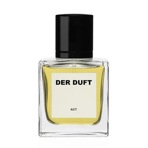 DER DUFT - Act Parfumflakon mit klarem Glas, schwarzem Verschluss und gelbem Duftinhalt vor weißem Hintergrund