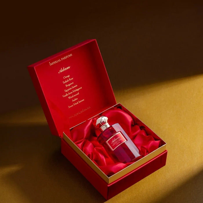 Imperial Parfums - Adam roter Flakon in luxuriöser Satinbox mit edlem goldfarbenem Akzent stilvoll präsentiert