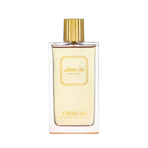 Cherigan - Adhara Oud Parfumflakon mit klarem Glas und goldfarbenem, geriffeltem Verschluss vor weißem Hintergrund