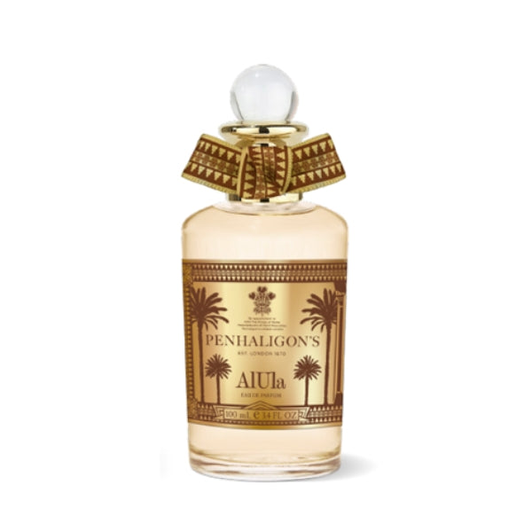 Penhaligon's - Trade Routes - AlUla Parfümflakon mit orientalischem Design und verziertem braunem Schleifenband vor weißem Hintergrund