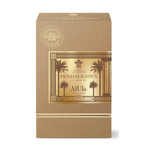 Penhaligon's - Trade Routes - AlUla Verpackung mit goldfarbenem Etikett und Palmenmotiv vor hellem Hintergrund